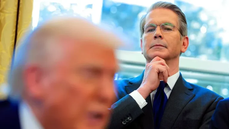 us-treasury-secretary-scott-bessent-looking-while-president-donald-trump-signs-executive-orders-in-the-oval-office